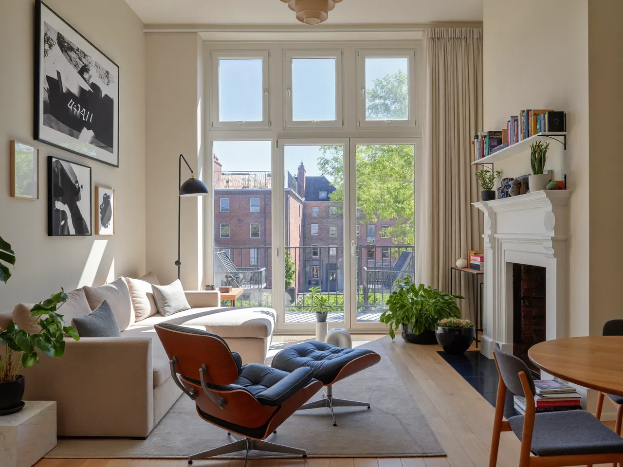 A bright living room with large, well-chosen new windows