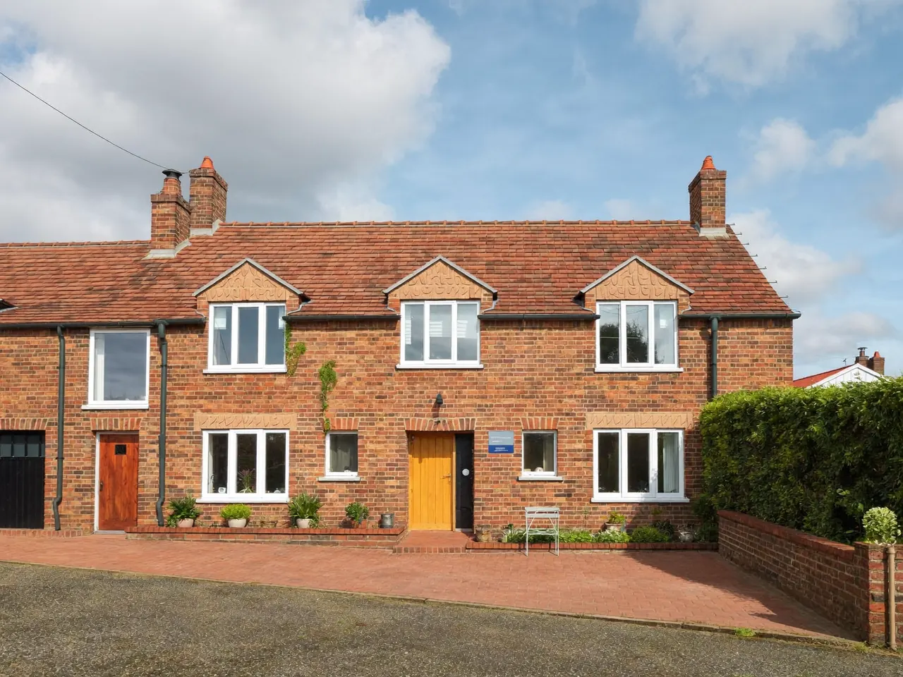 A secure semi-detached home with new white windows and modern locks